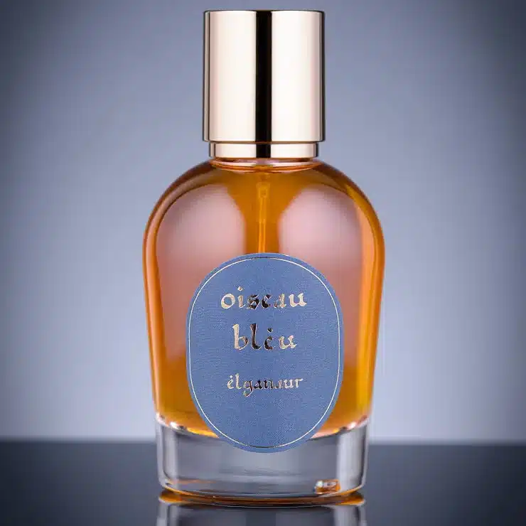 Parfum Oiseau bleu Elganaur dans un flacon en verre avec étiquette bleue