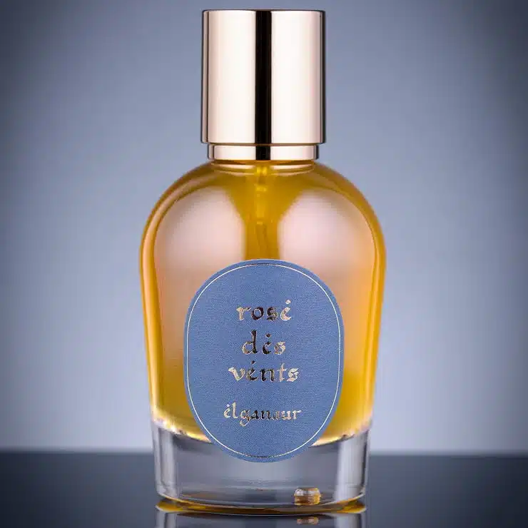 Parfum Rose des vents Elganaur dans un flacon en verre avec étiquette bleue